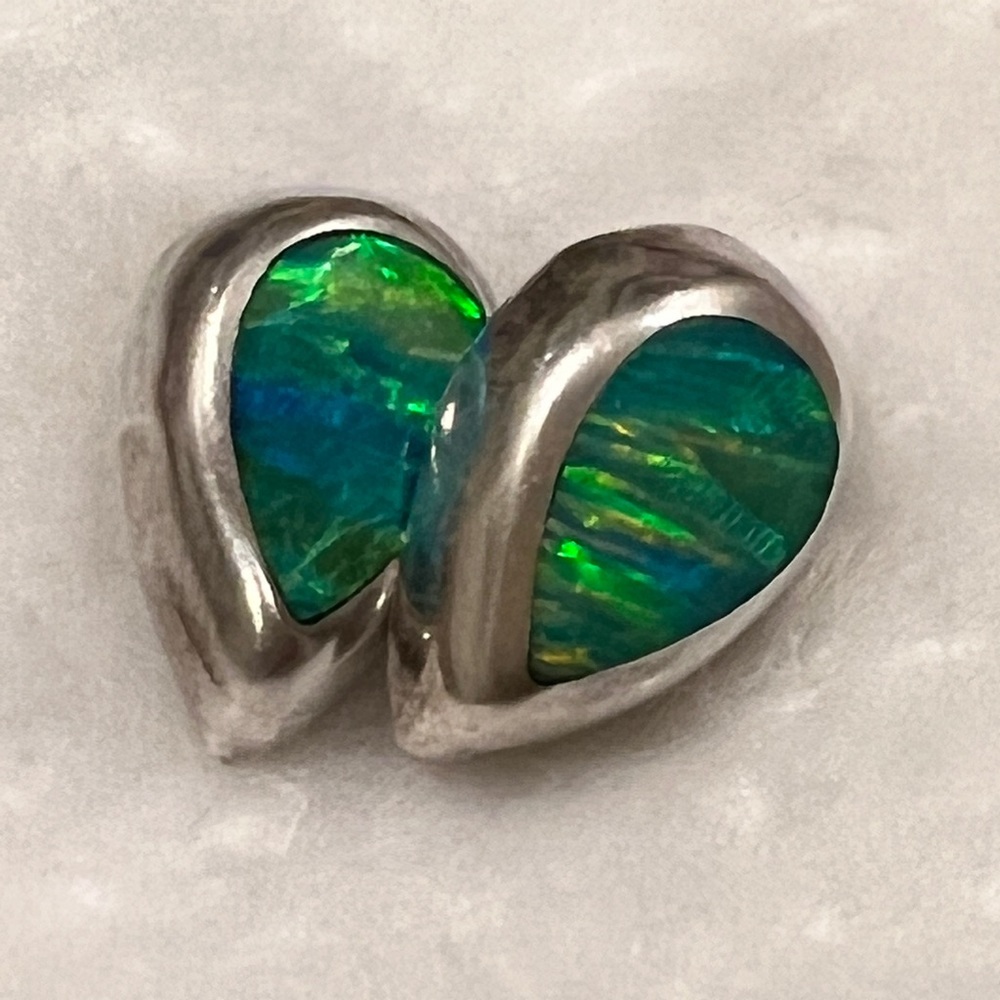 Fire opal earrings purchased in Cancun Mexico. 950 sterling.